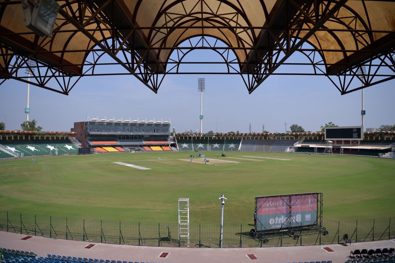 Ground staff prepare the pitch of the Gaddafi Stadium, Lahore, September 7, 2017