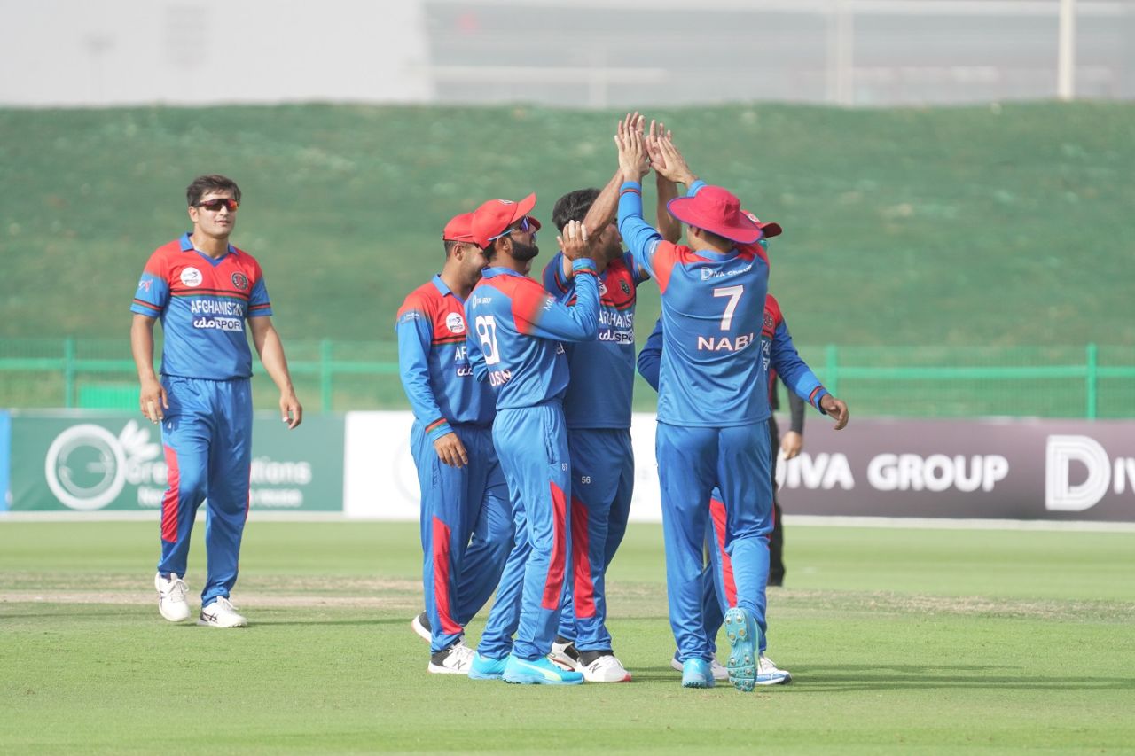 Afghanistan players celebrate a wicket, Afghanistan vs Zimbabwe, 1st T20I, Abu Dhabi, March 17, 2021