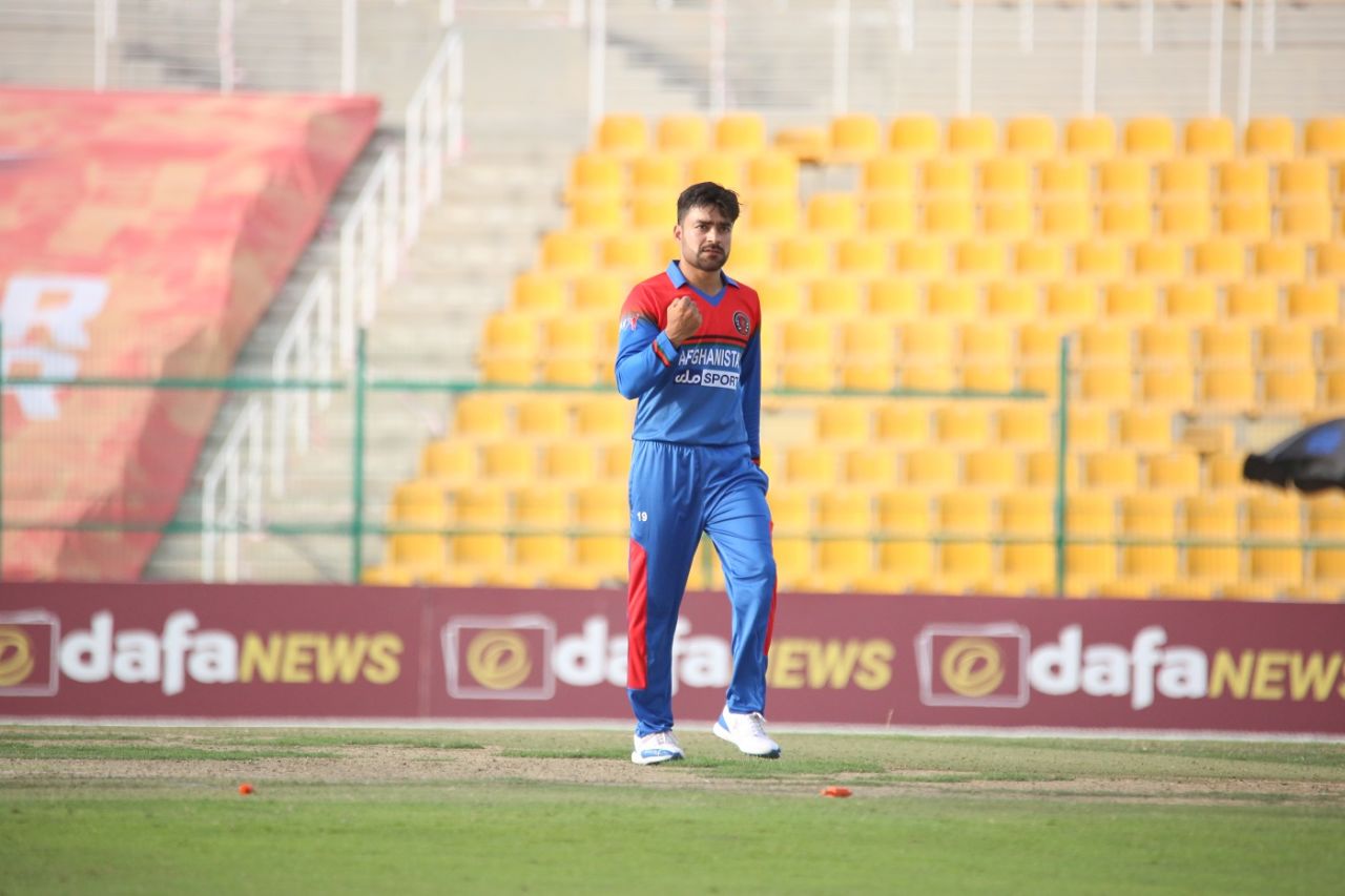 Rashid Khan celebrates a wicket, Afghanistan vs Zimbabwe, 1st T20I, Abu Dhabi, March 17, 2021