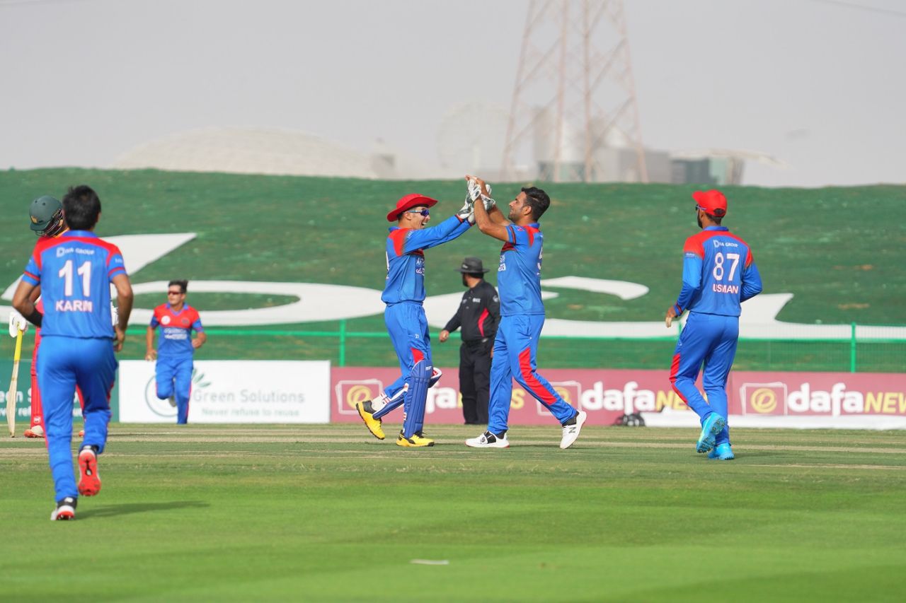 Fareed Ahmad celebrates a dismissal, Afghanistan vs Zimbabwe, 2nd T20I, Abu Dhabi, March 19, 2021