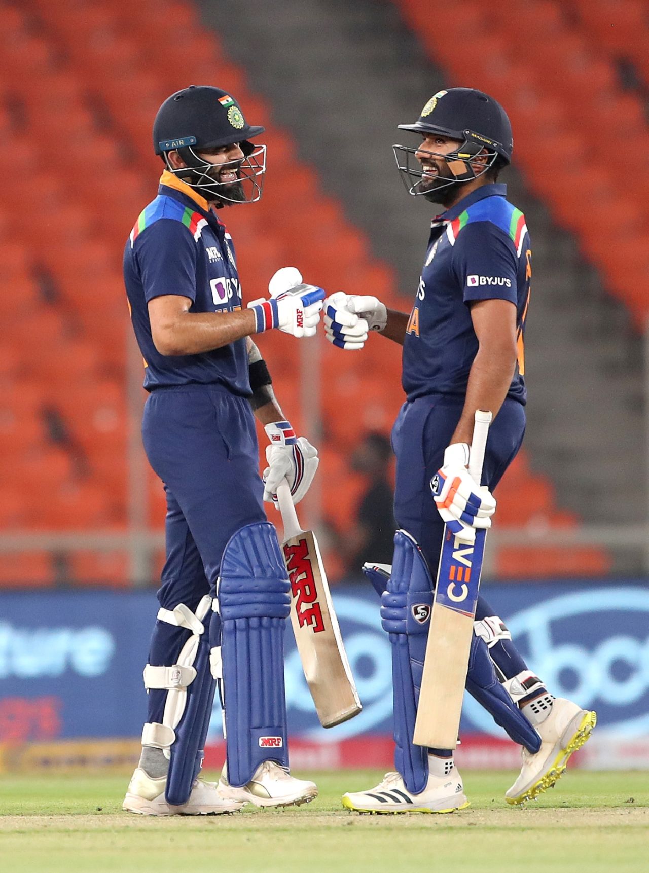 Virat Kohli and Rohit Sharma share a laugh during a blazing opening stand, India vs England, 5th T20I, Ahmedabad, March 20, 2021