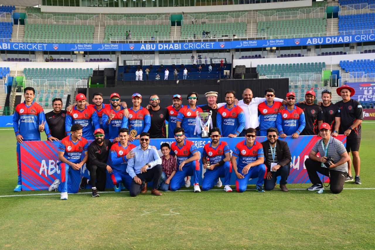 The Afghanistan team poses with the trophy, Afghanistan vs Zimbabwe, 3rd T20I, Abu Dhabi, March 20, 2021