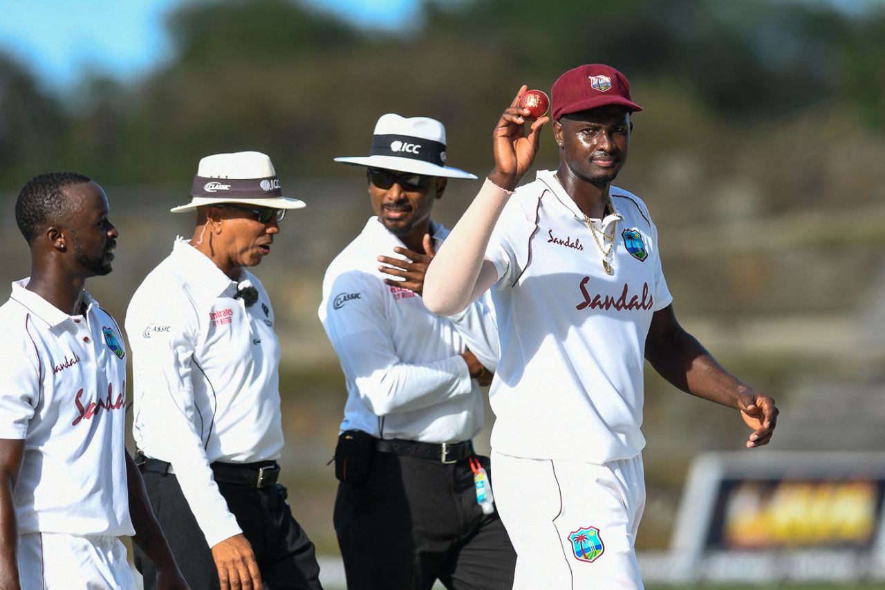 Jason Holder holds the ball aloft after completing his eighth five-wicket haul in Tests, West Indies vs Sri Lanka, 1st Test, North Sound, 1st day, March 21, 2021