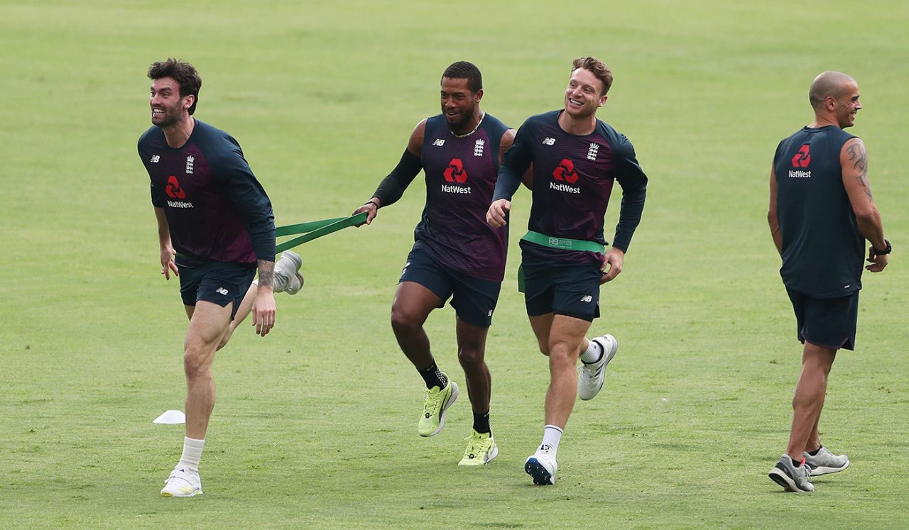 Reece Topley, Chris Jordan and Jos Buttler take part in a fitness drill, Pune, March 22, 2021