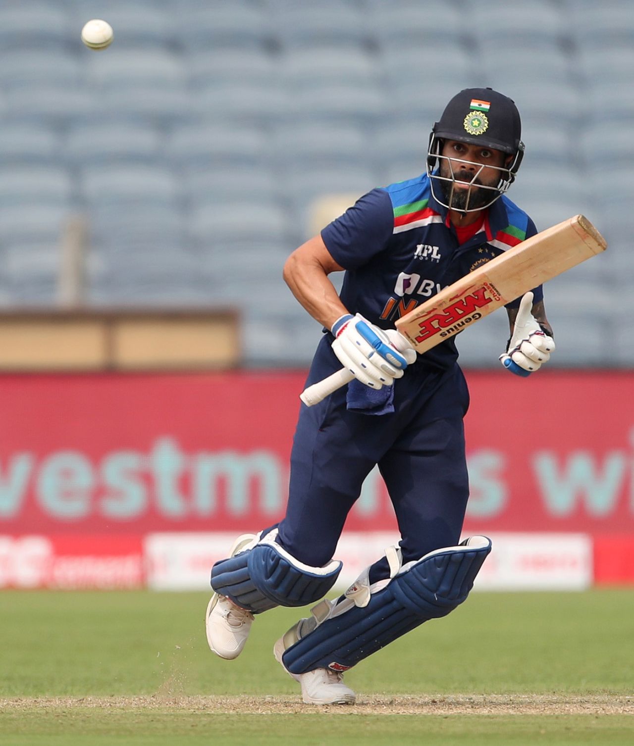 Virat Kohli sets off for a quick run, India vs England, 1st ODI, Pune, March 23, 2021