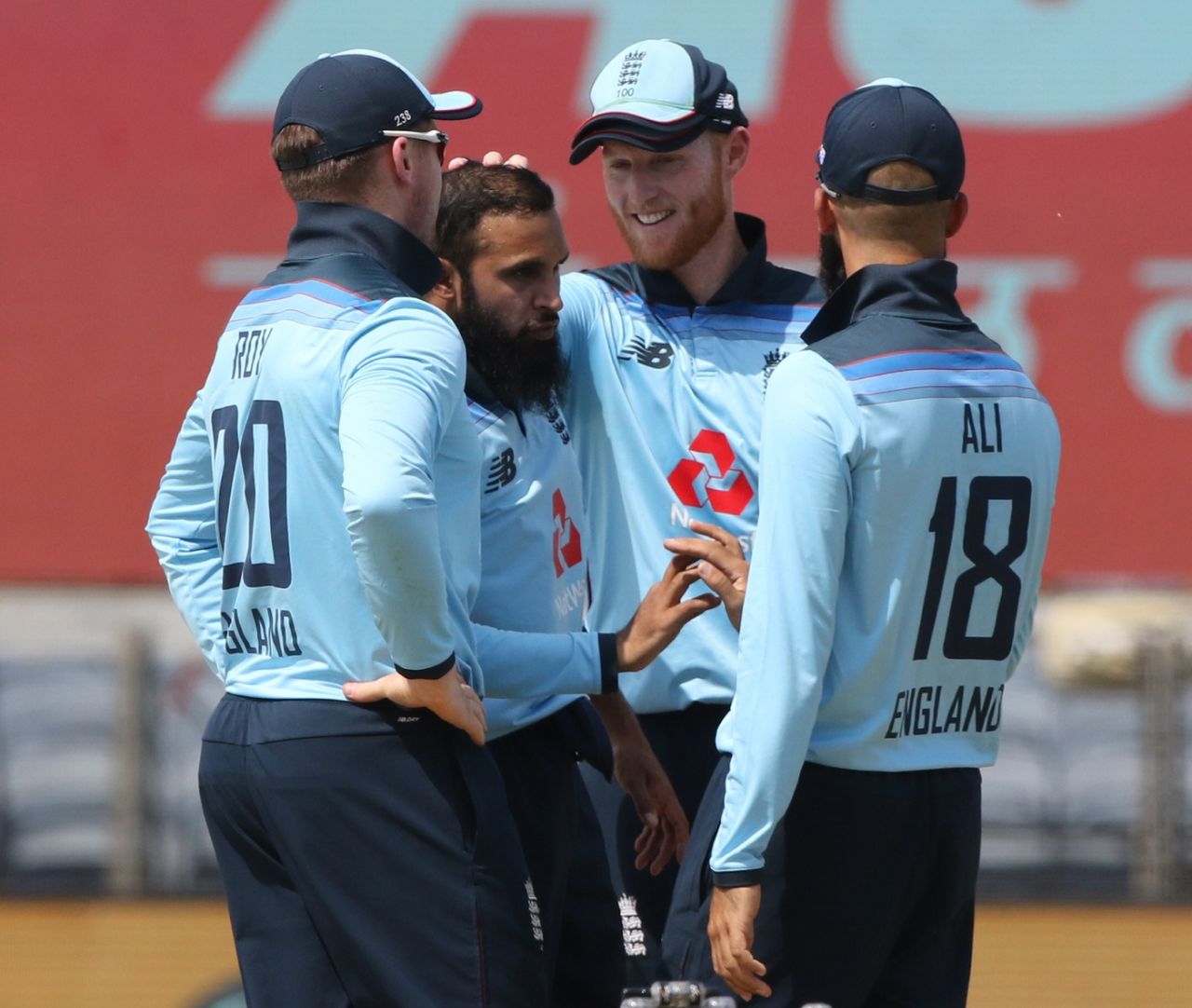 Adil Rashid is congratulated after picking up a wicket, India vs England, 3rd ODI, Pune, March 28, 2021