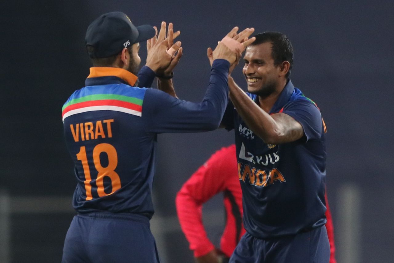 T Natarajan celebrates Ben Stokes' wicket with Virat Kohli, India vs England, 3rd ODI, Pune, March 28, 2021

