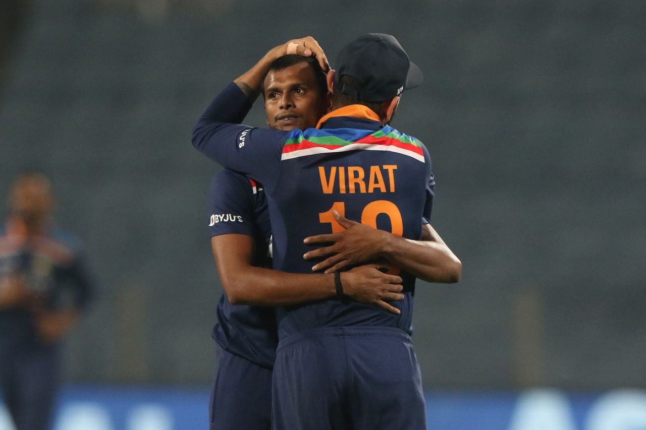 T Natarajan gets a hug from Virat Kohli after completing the job for India, India vs England, 3rd ODI, Pune, March 28, 2021

