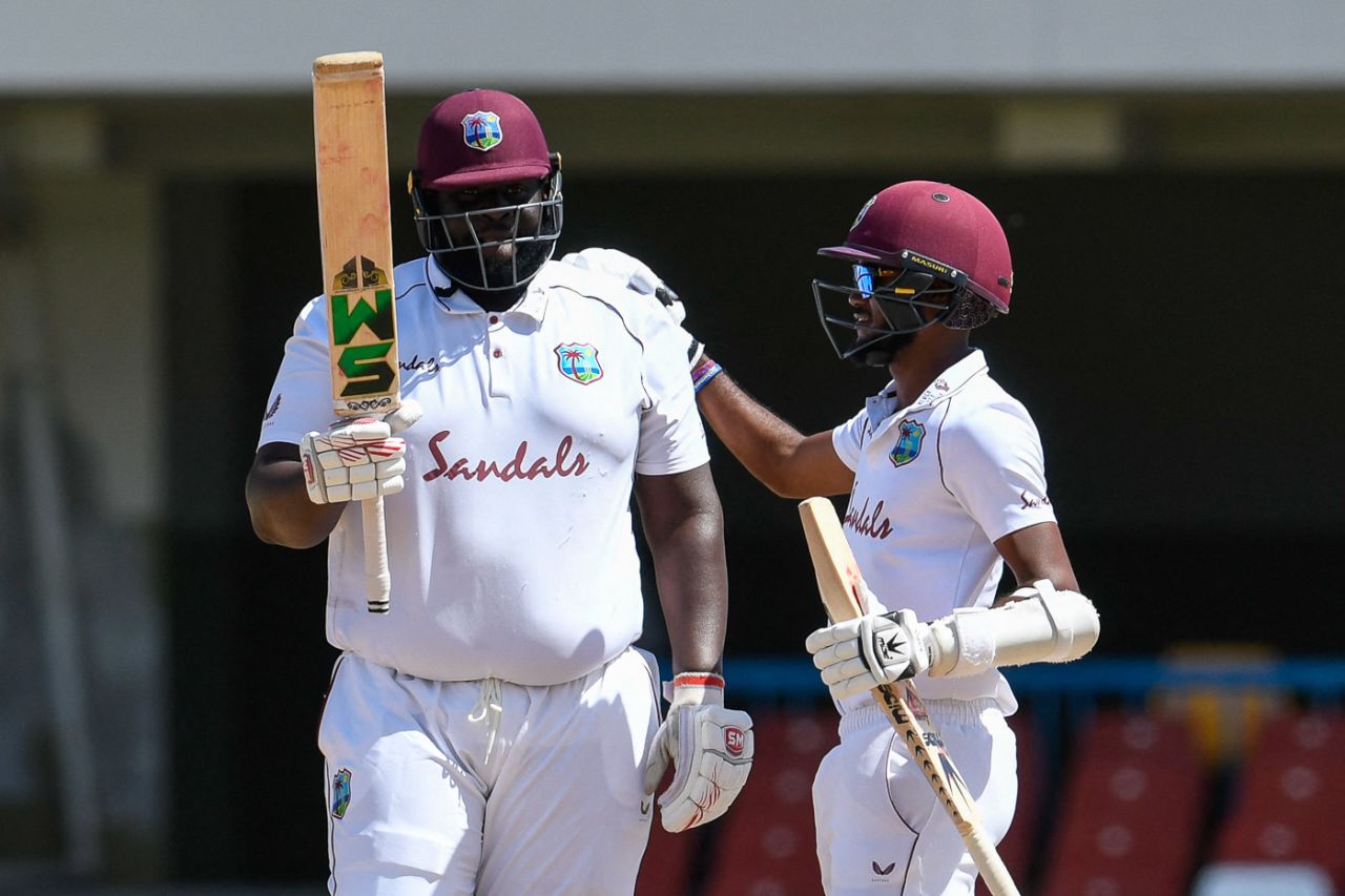 Rahkeem Cornwall raises his bat after his second Test match half-century, West Indies vs Sri Lanka, 2nd Test, 2nd Day, North Sound, March 30, 2021