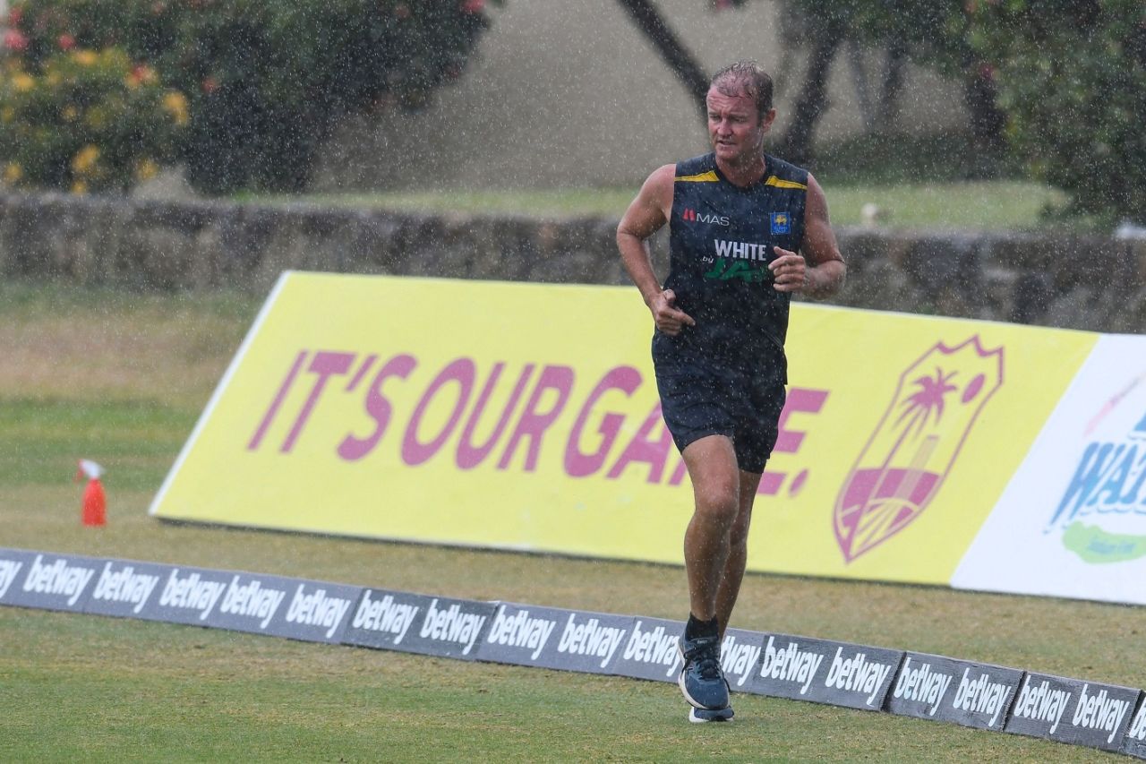 Pelting rain can't stop Sri Lanka's batting coach Grant Flower from having a run, West Indies vs Sri Lanka, 2nd Test, North Sound, 3rd day, March 31, 2021