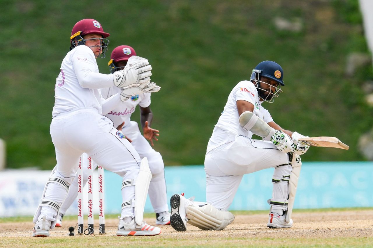 Dimuth Karunaratne sweeps as Joshua Da Silva looks on, West Indies v Sri Lanka, 2nd Test, North Sound, 5th day, April 2, 2021