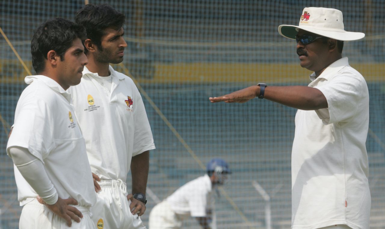 Pravin Amre talks to Sahil Kukreja (far left) and Abhishek Nayar during a practice session ahead of Mumbai's Ranji Trophy game against Maharashtra, Mumbai, November 29, 2007