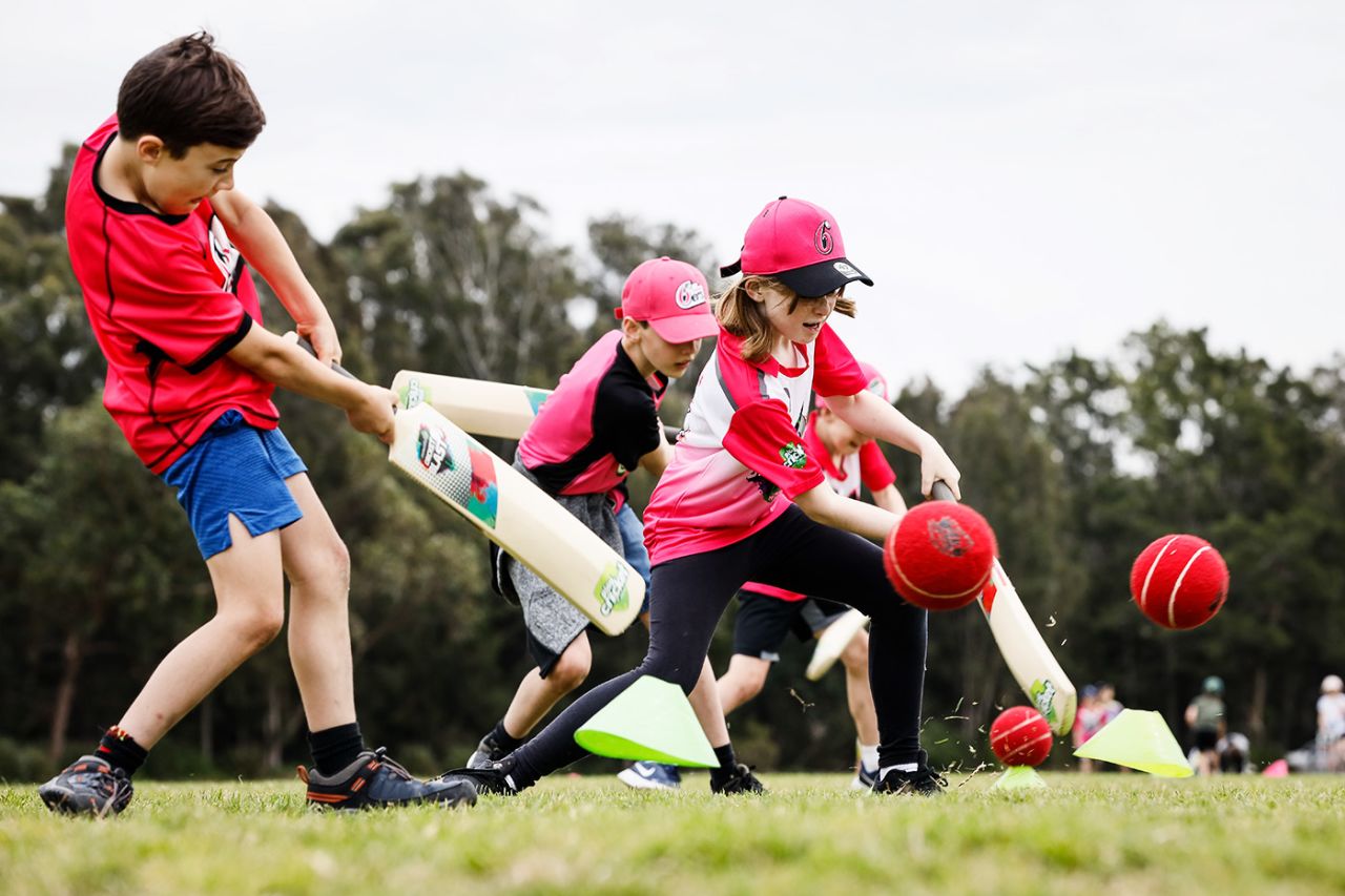 Kids play cricket during the Cumberland Regional School Holiday Program at Nolan's Reserve, Sydney, September 30, 2020