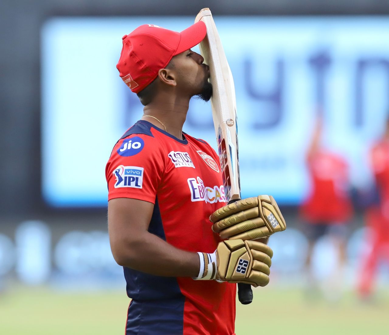 Nicholas Pooran kisses his bat during a practice session, Mumbai, April 12, 2021