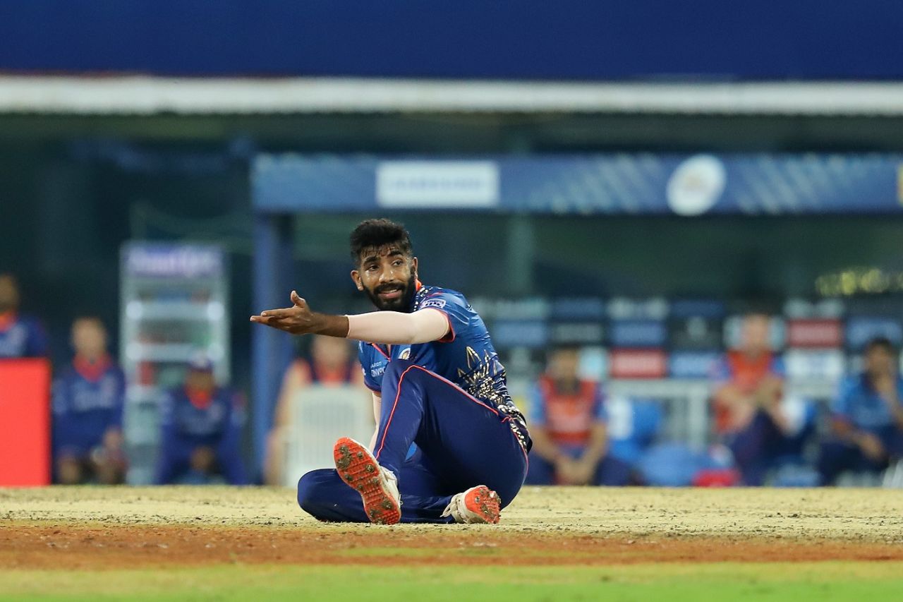 Jasprit Bumrah hits the ground after the ball slipped out of his hand, Mumbai Indians vs Delhi Capitals, IPL 2021, Chennai, April 20, 2021