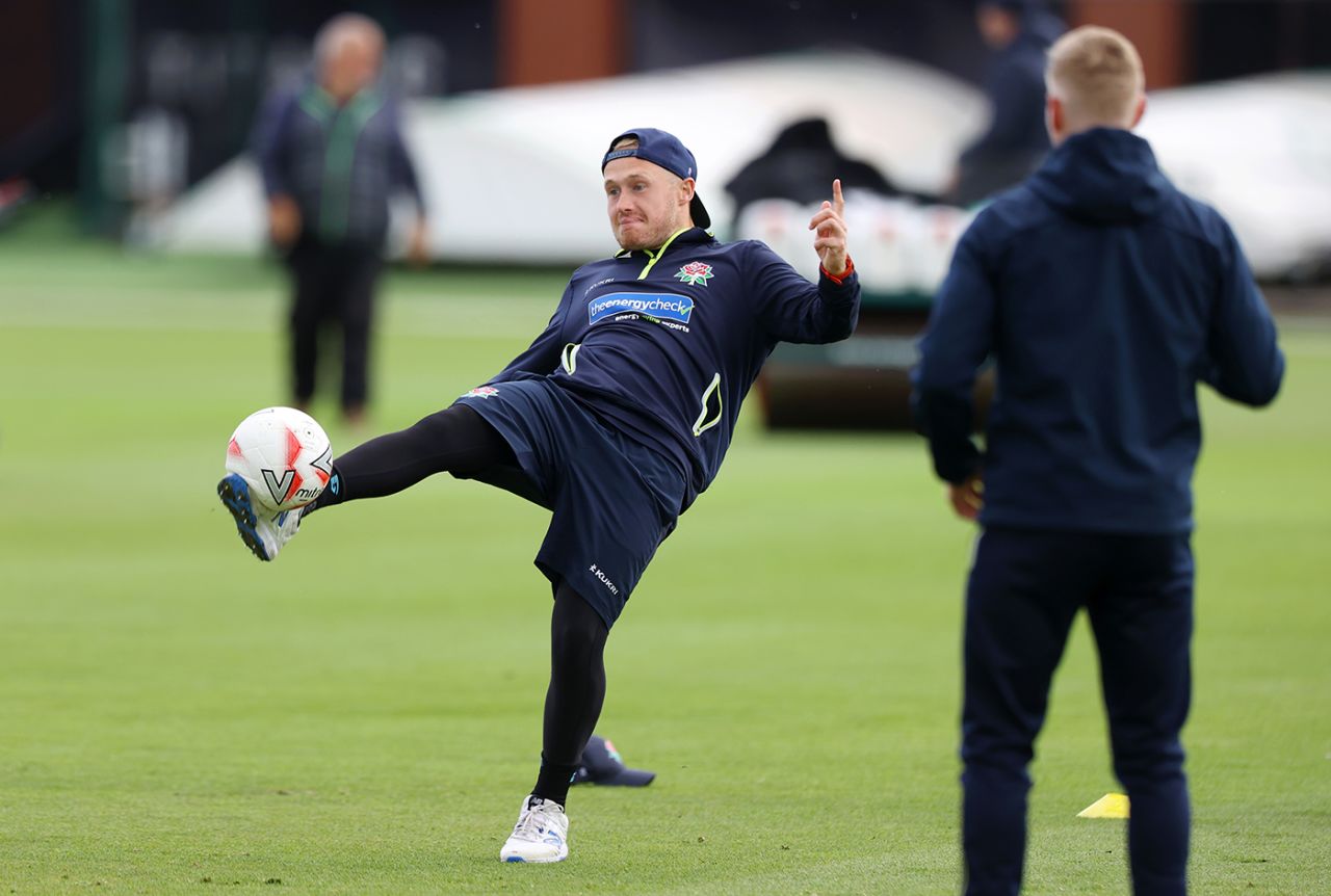 Matt Parkinson keeps his eye on the ball during Lancashire's game of warm-up football