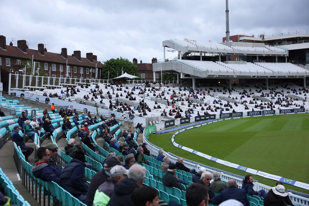 Spectators at The Oval despite the poor weather, Surrey vs Middlesex, LV= Insurance Championship, The Oval, London, 1st day, May 20, 2021