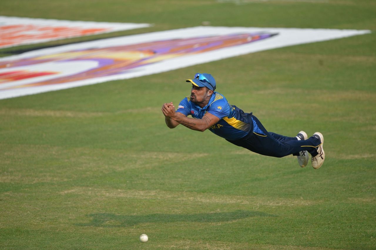 Danushka Gunathilaka throws himself forward in quest of a catch, Bangladesh vs Sri Lanka, 1st ODI, Dhaka, May 23, 2021