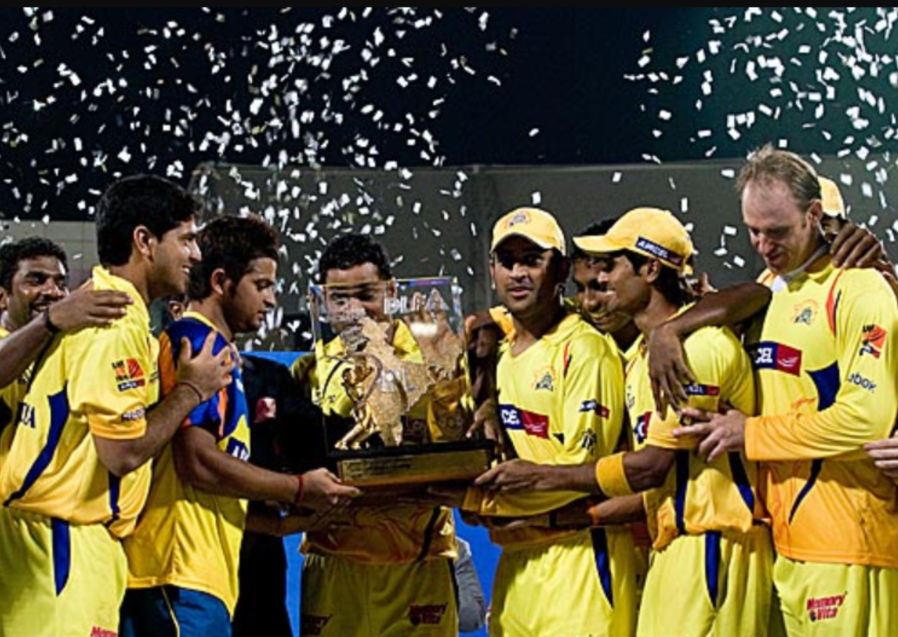 The Chennai Super Kings players pose with the IPL 2010 trophy, Mumbai, April 25, 2010