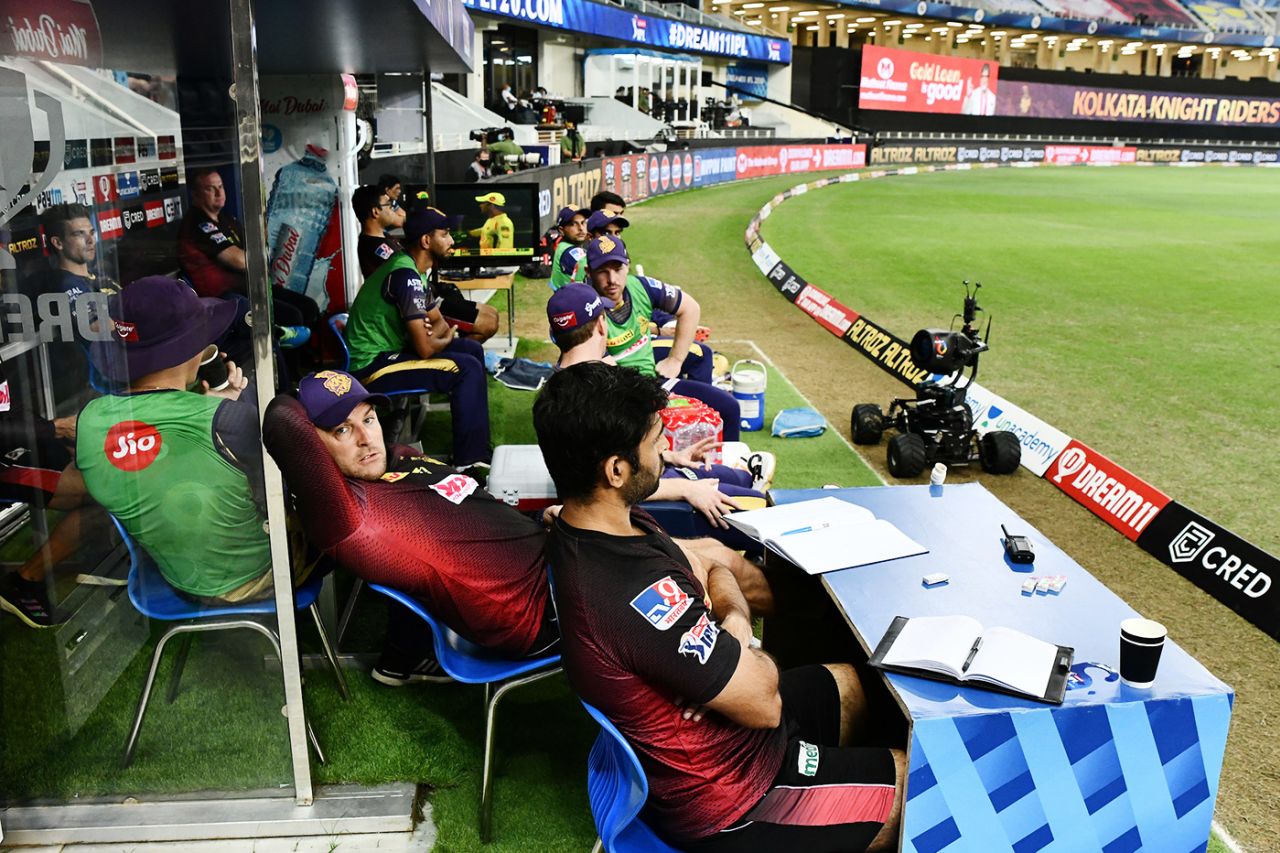 Brendon McCullum and the Kolkata Knight Riders' management and players watch the game from the dugout, Chennai Super Kings vs Kolkata Knight Riders, IPL 2020, Dubai, October 29, 2020