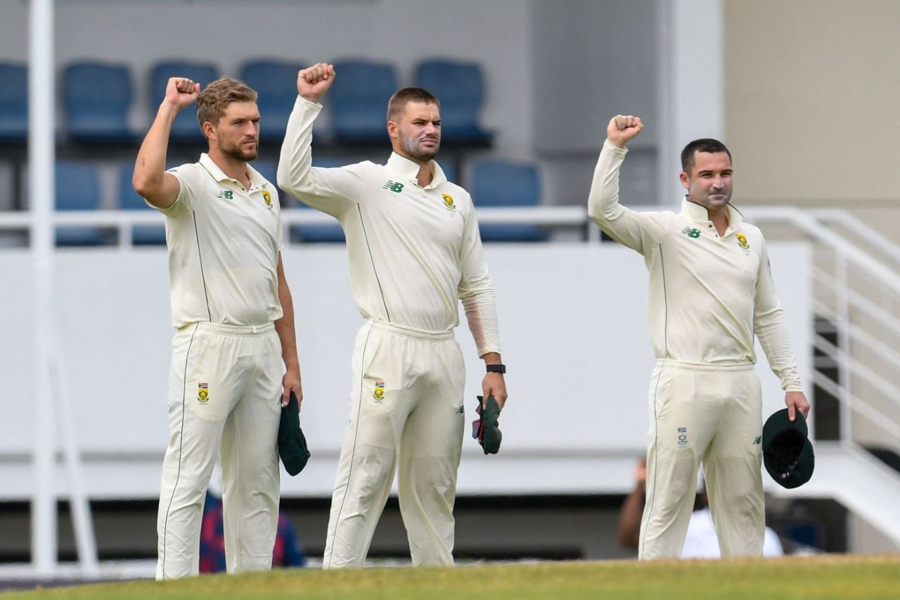 Wiaan Mulder, Aiden Markram and Dean Elgar raise their fist in support of the Black Lives Matter movement, West Indies vs South Africa, 1st Test, St Lucia, 1st day, June 10, 2021