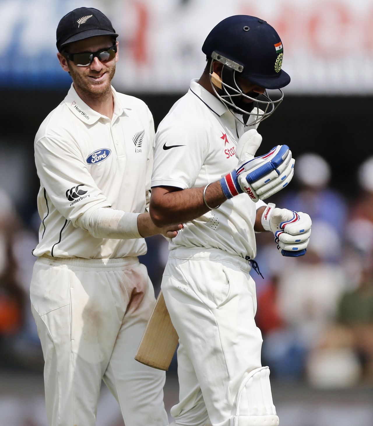 Kane Williamson congratulates Virat Kohli on his innings after his dismissal, India v New Zealand, 3rd Test, Indore, 2nd day, October 9, 2016