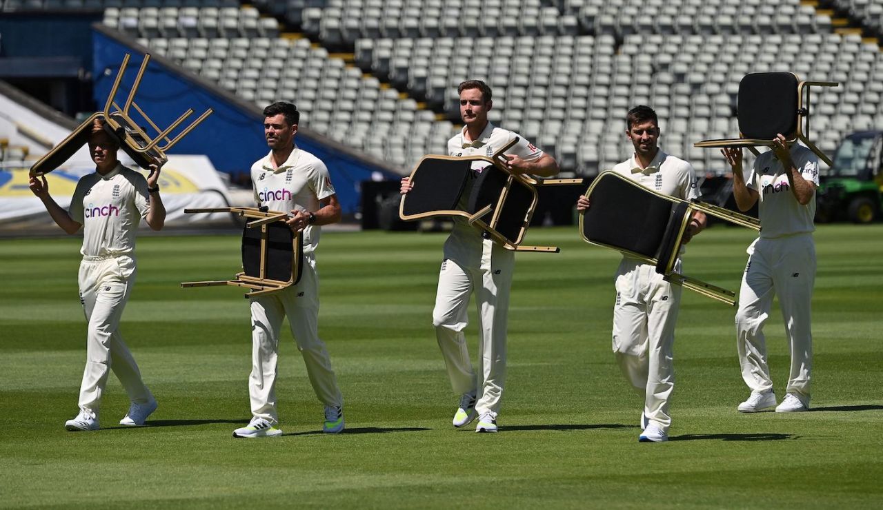 The England team carry chairs off the pitch after posing for a team photo before a training session, New Zealand tour of England, Edgbaston,  June 8, 2021