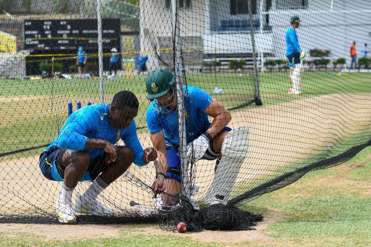 Kagiso Rabada and Aiden Markram find something to inspect in the nets, St Lucia, June 16, 2021