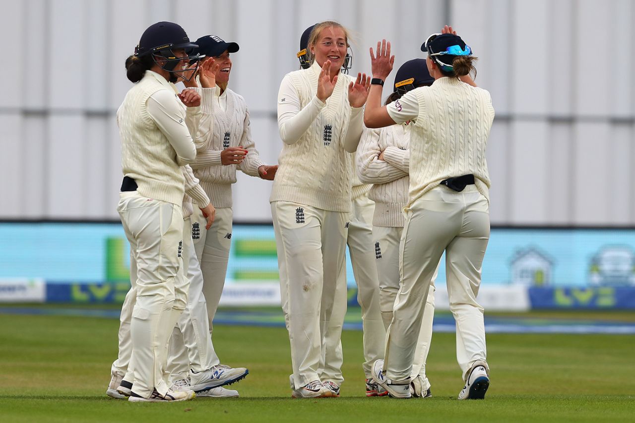 Sophie Ecclestone is mobbed by her team-mates, England v India, only Women's Test, Bristol, 3rd day, June 18, 2021
