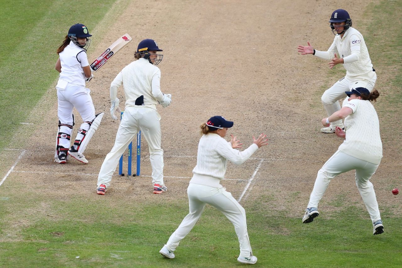 Taniya Bhatia and the England fielders watch on as Anya Shrubsole misses a chance, England v India, only Women's Test, Bristol, 4th day, June 19, 2021