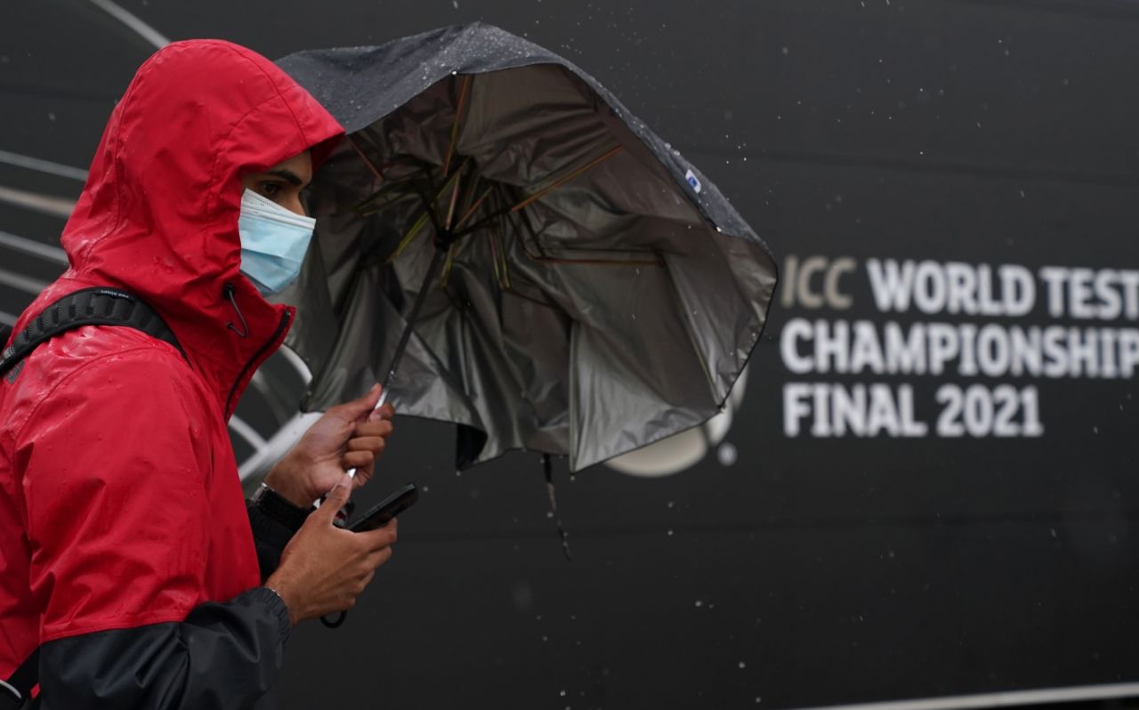 A fan braves the rain at the WTC final, India vs New Zealand, World Test Championship (WTC) final, 3rd day, Southampton, June 20, 2021
