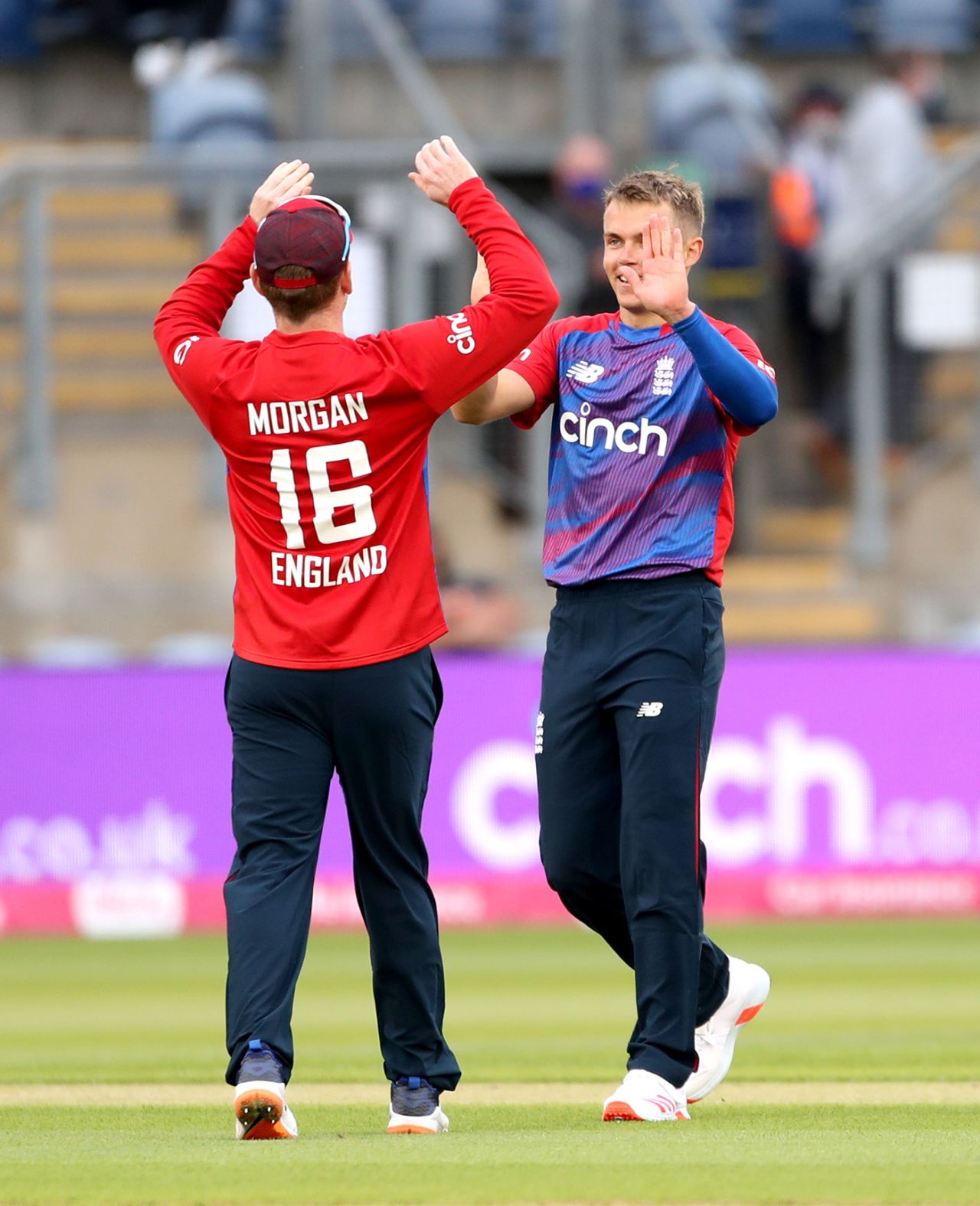 Sam Curran gets a pair of high fives from his captain, England vs Sri Lanka, 1st T20I, Cardiff, June 23, 2021