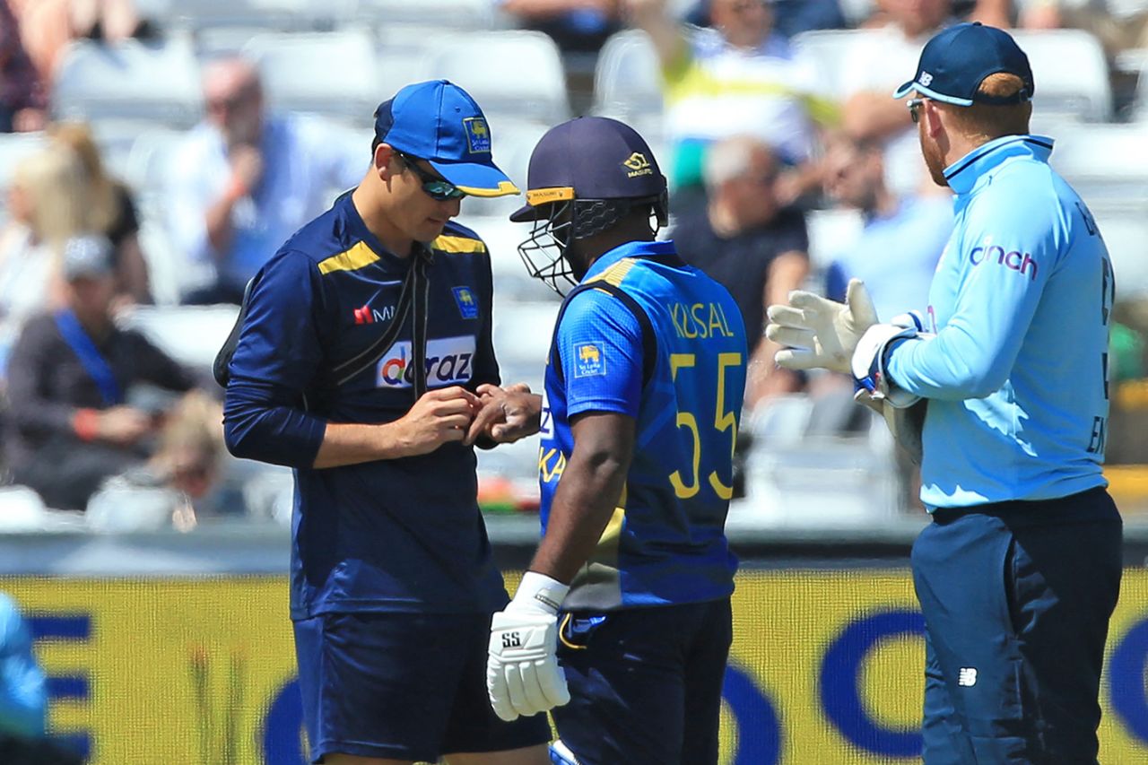Kusal Perera gets treatment after a blow on the glove, England vs Sri Lanka, 1st ODI, Chester-le-Street, June 29, 2021