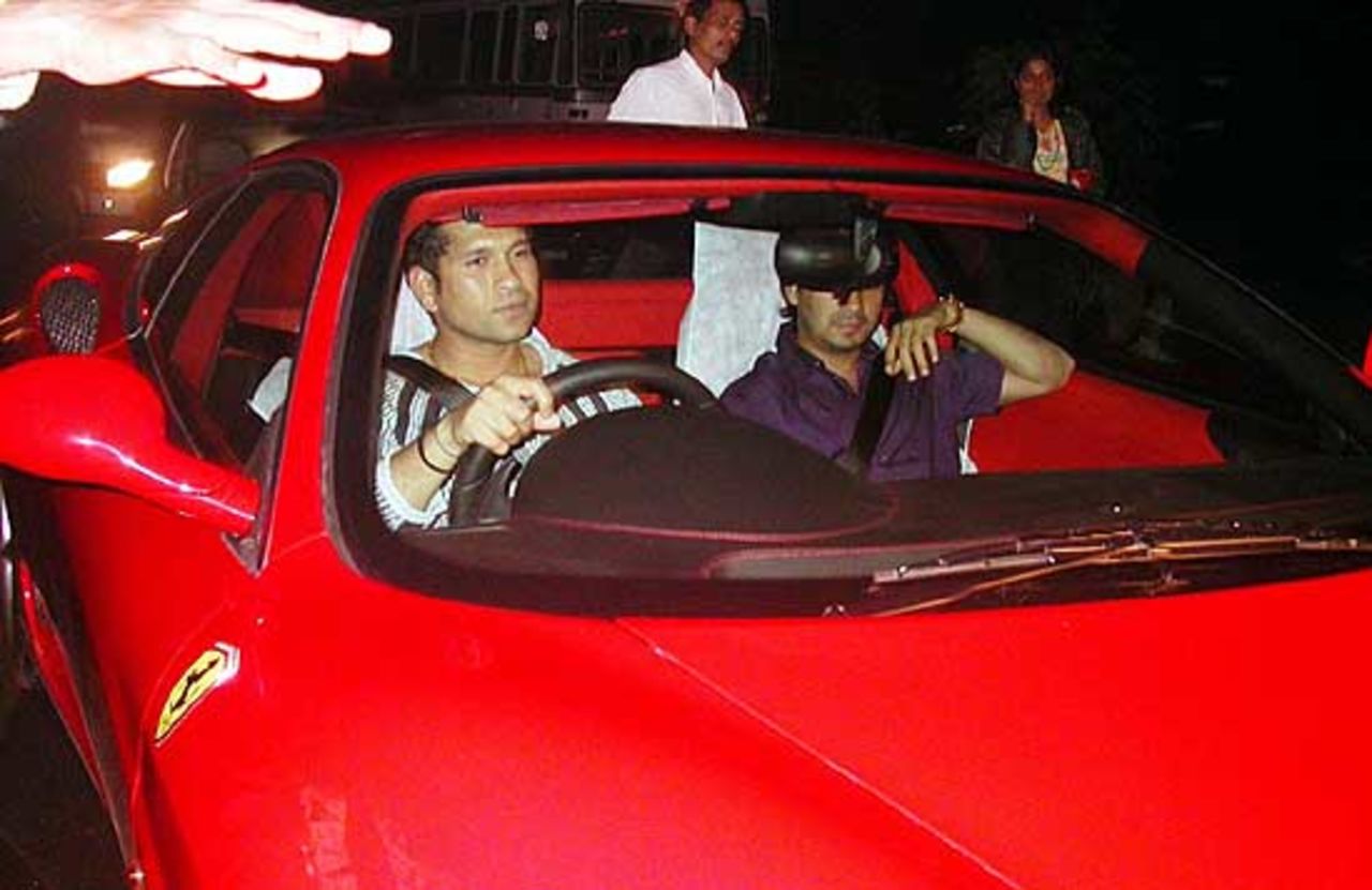 Sachin Tendulkar takes possession of his prize Ferrari-360 Modena