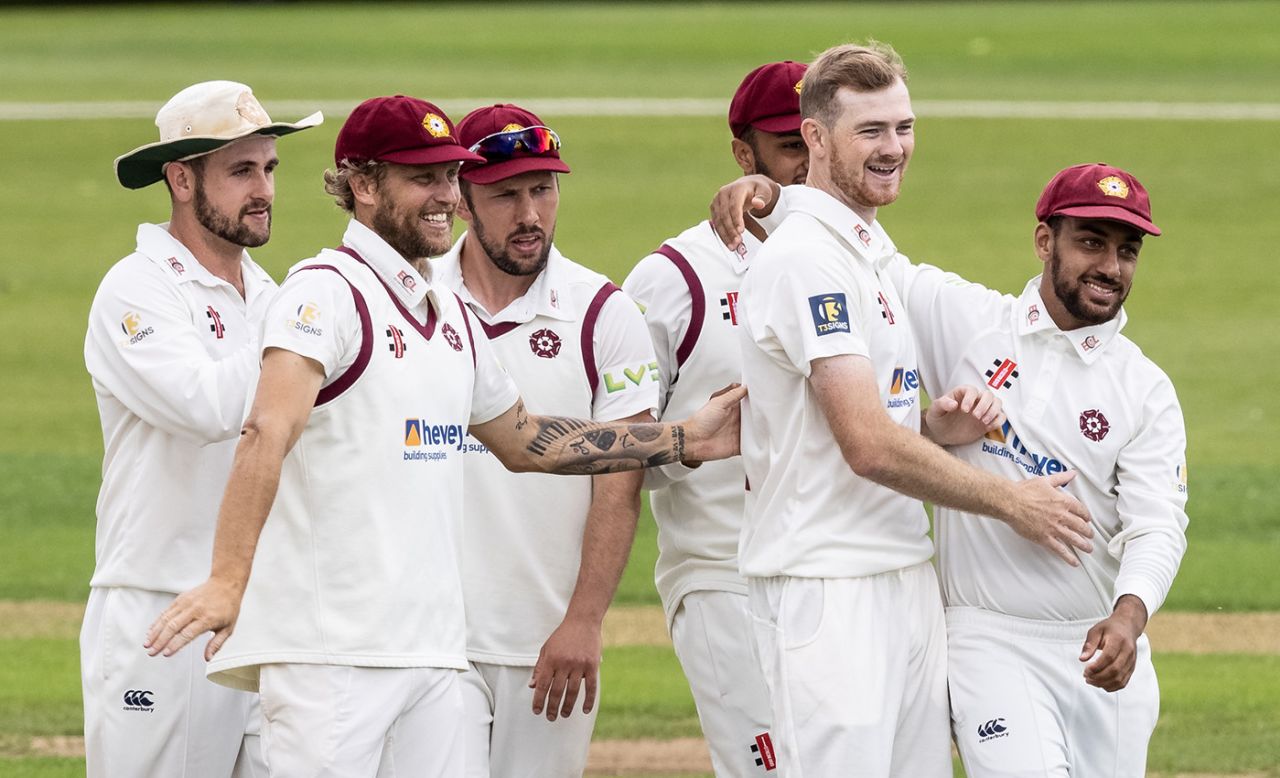 Tom Taylor celebrates with his team-mates, Northamptonshire vs Yorkshire, County Championship, Group Three, Wantage Road, July 4, 2021