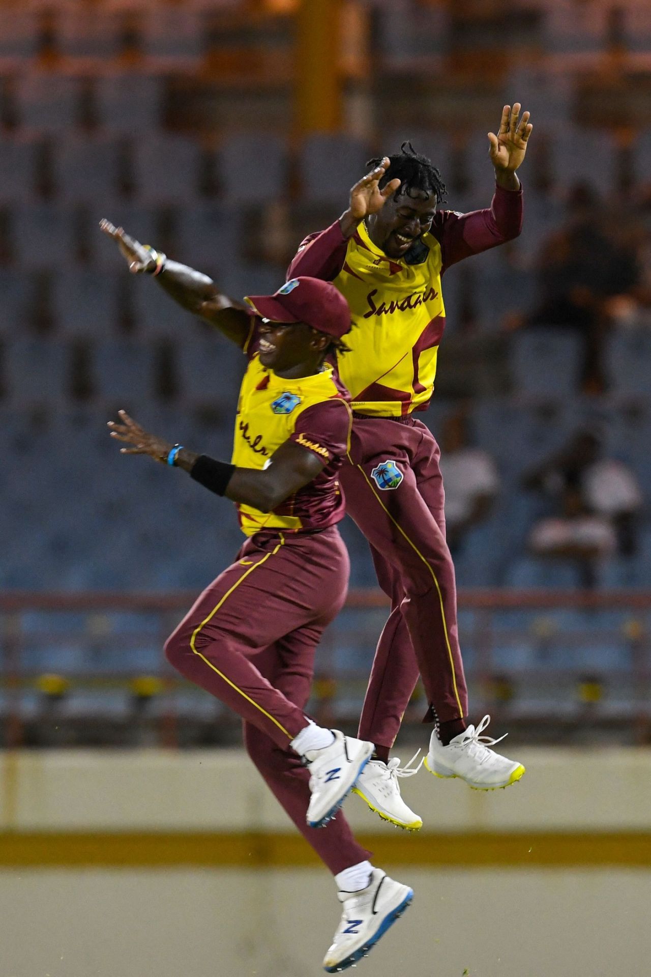 Hayden Walsh Jr. and Fidel Edwards celebrate a wicket, West Indies vs Australia, 1st T20I, St Lucia, July 9, 2021