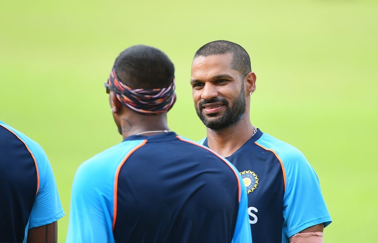 Shikhar Dhawan sports a smile while having a conversation with his team-mates, Sri Lanka vs India, Colombo, July 16, 2021
