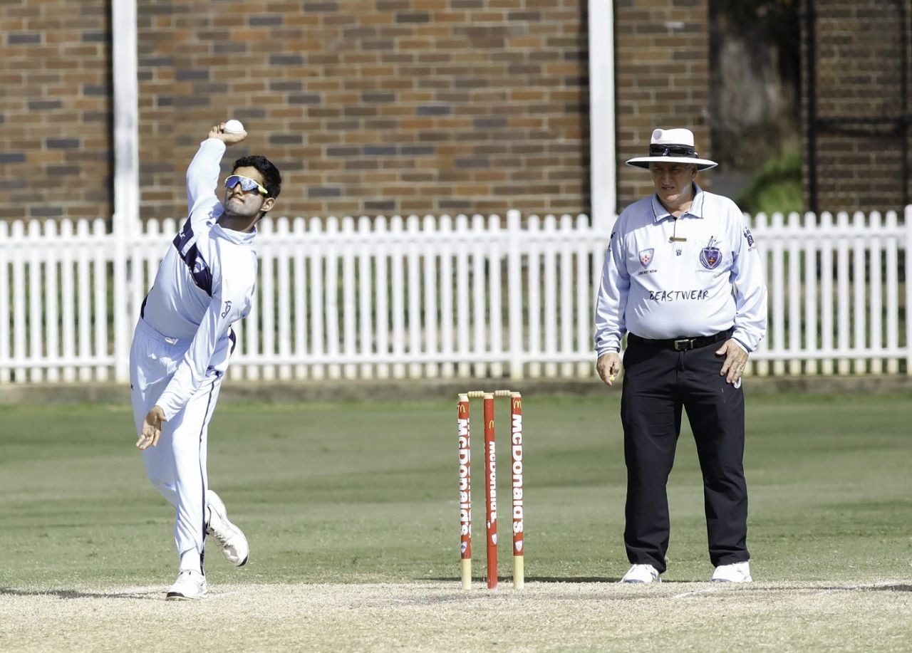 Nivethan Radhakrishnan bowls offspin