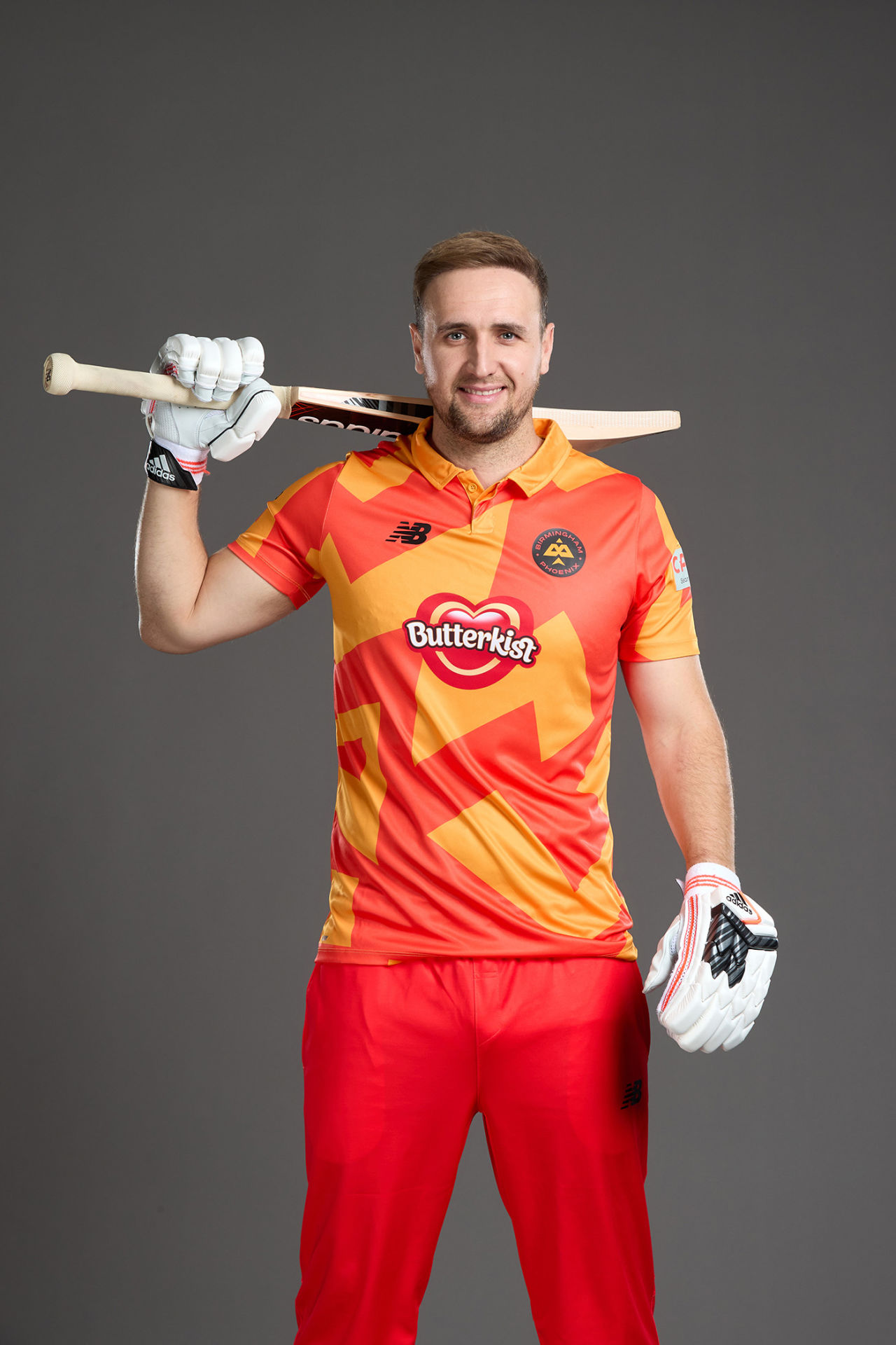 Liam Livingstone poses in his Birmingham Phoenix kit