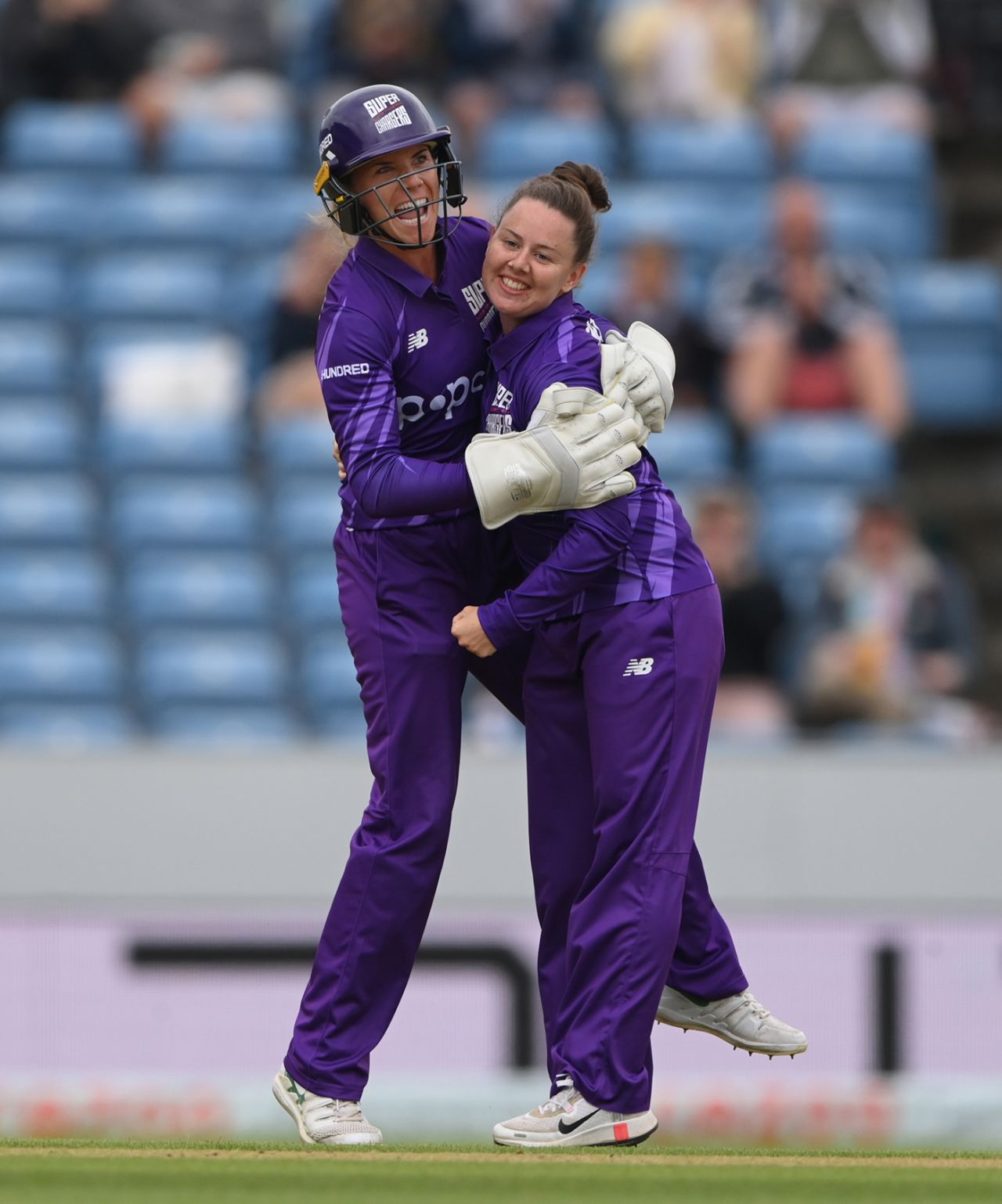 Linsey Smith gets a hug from Lauren Winfield-Hill, Northern Superchargers vs Welsh Fire, Women's Hundred, Headingley, July 23, 2021