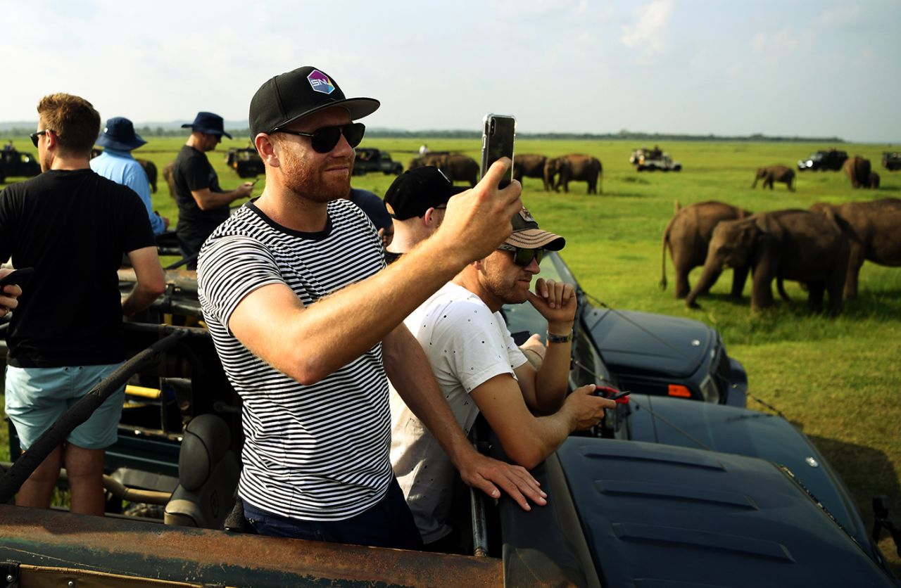 Jonny Bairstow takes a photograph during the England players' visit to the Kaudulla National Park in Dambulla, October 11, 2018