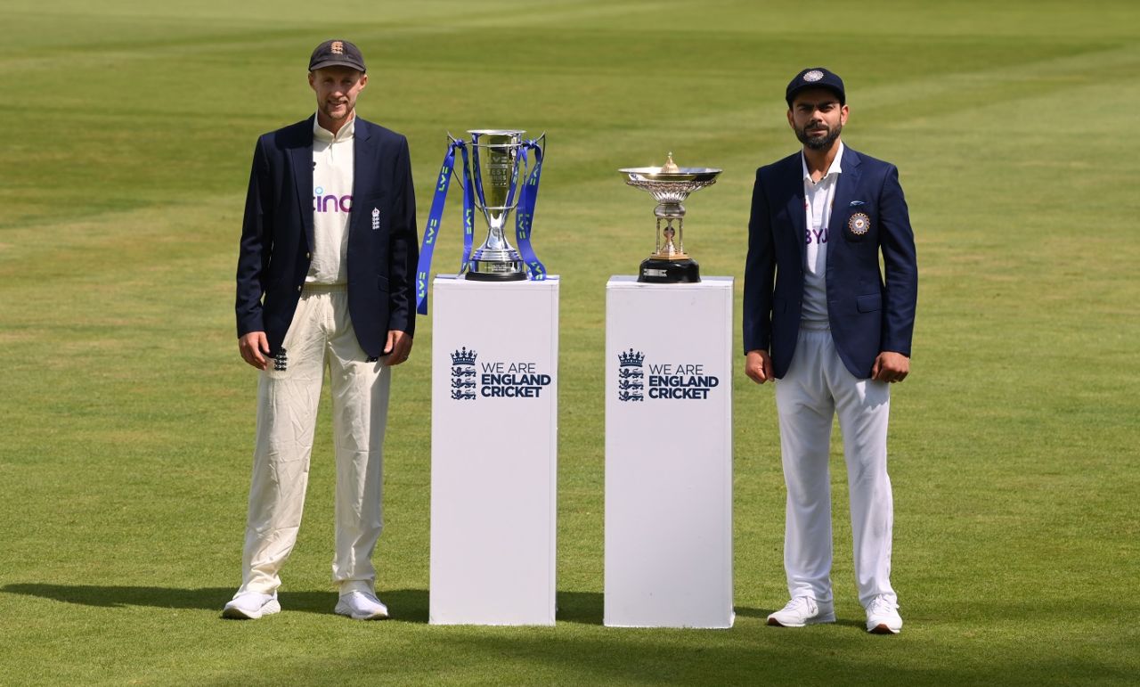 Joe Root and Virat Kohli pose with the Test trophy that England and India will vie for, August 2, 2021