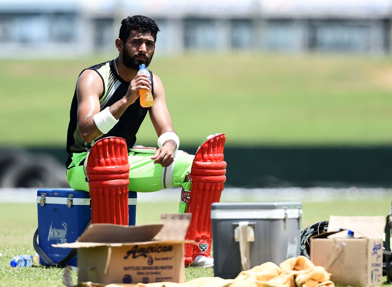 Sikandar Raza sips a drink during a training session in Galle, Colombo, June 28, 2017