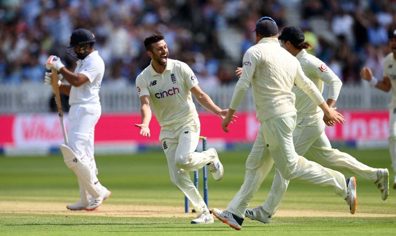 Mark Wood sets off on a celebratory run, pursued by team-mates, after claiming Rohit Sharma, England vs India, 2nd Test, Lord's, London, 4th day, August 15, 2021

