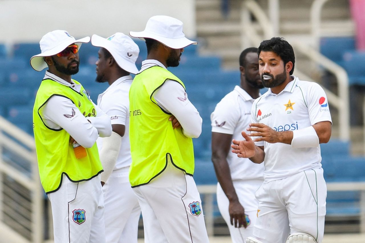 'That's how you angle your run-up to avoid a wet patch' - Mohammad Rizwan seems to be saying to the West Indies players, West Indies vs Pakistan, 2nd Test, Jamaica, 3rd day, August 22, 2021