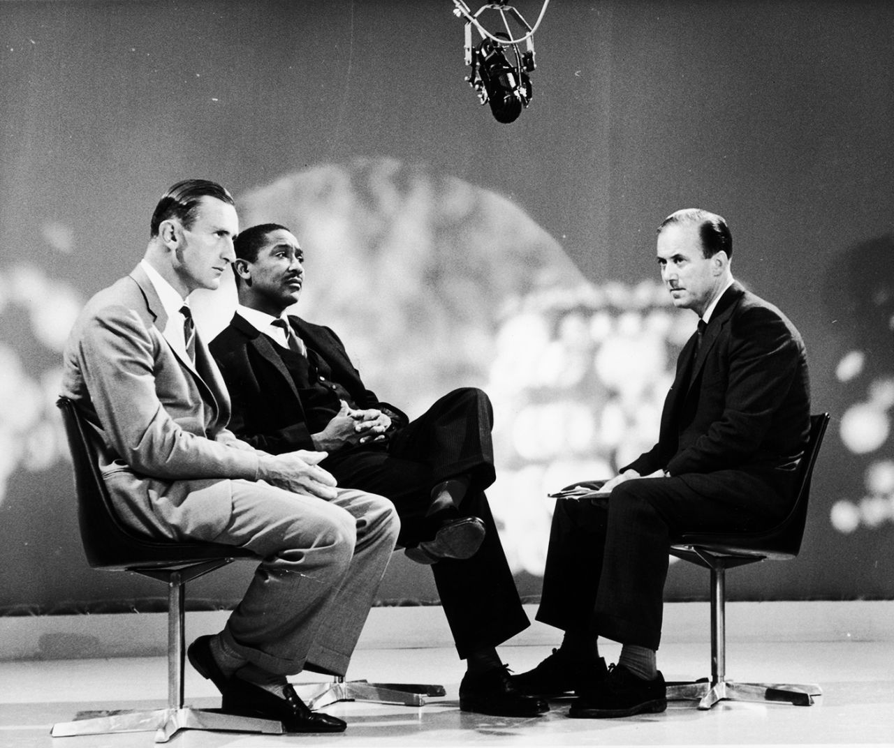 Ted Dexter and Frank Worrell, England and West Indies' captains, attend an interview with the BBC's Peter West, August 27, 1963