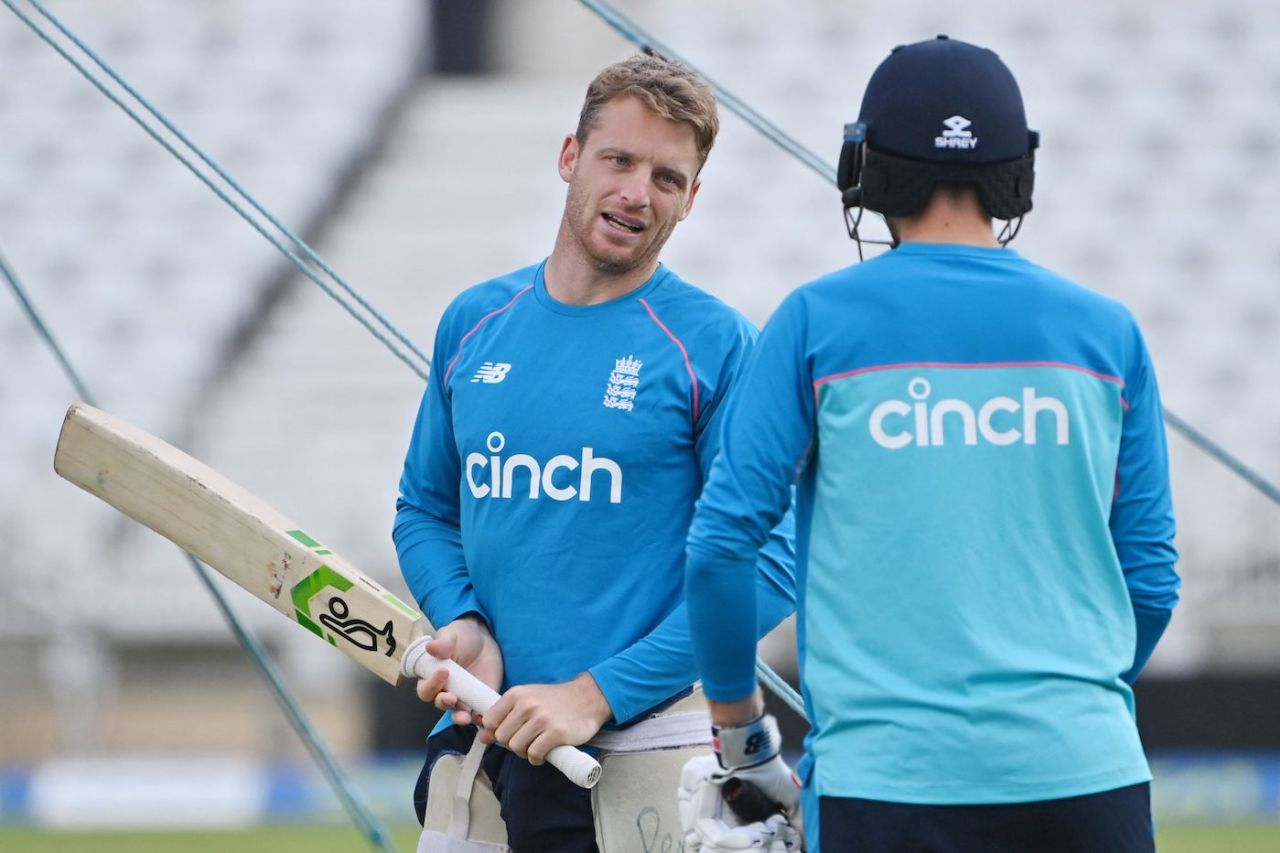 Jos Buttler talks to Joe Root during a training session, Nottingham, August 3, 2021