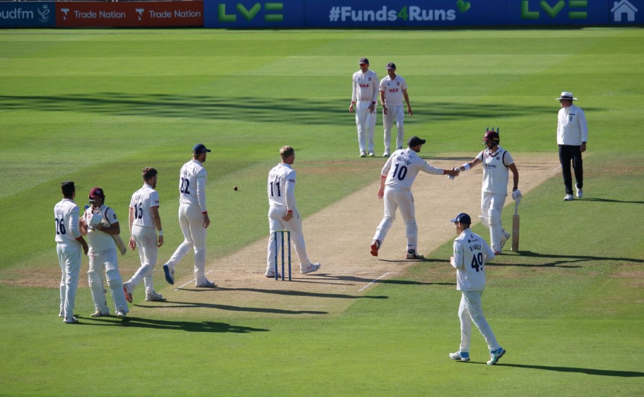 Essex and Northamptonshire shake hands at the end of the shortest County Championship four-day fixture, Essex vs Northamptonshire, County Championship, 2nd day, Chelmsford, September 22, 2021