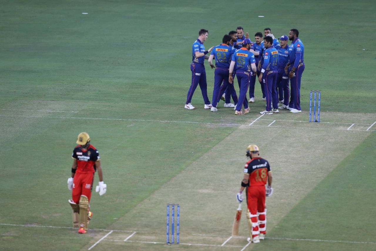 Mumbai Indians gather around after Jasprit Bumrah claims Devdutt Padikkal, Royal Challengers Bangalore vs Mumbai Indians, Dubai, IPL 2021, September 26, 2021