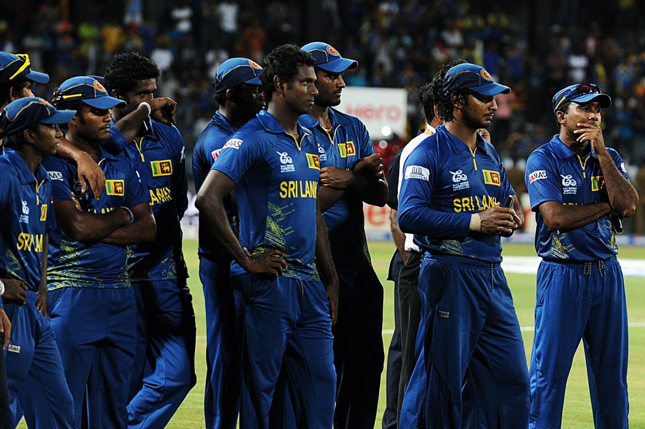 Disappointed Sri Lanka players watch the post-match presentation, Sri Lanka v West Indies, final, World Twenty20, Colombo, October 7, 2012